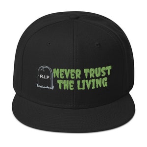 Never Trust The Living Snapback Hat / Embroidered
