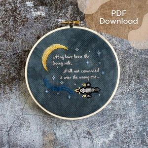 Può includere: Uno schema di ricamo a punto croce con una luna crescente, stelle e un razzo con il testo "May have been the losing side. Still not convinced it was the wrong one..."