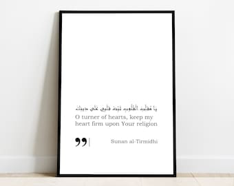 May include: Black and white printable wall art featuring an Arabic quote that translates to "O turner of hearts, keep my heart firm upon Your religion." The quote is attributed to Sunan al-Tirmidhi.