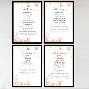 May include: Four printable Islamic art prints with Arabic calligraphy and English translations. The prints feature a floral design in shades of pink, orange, and yellow. The text includes the names of the surahs An-Nas, Al-Falaq, Al-Ikhlas, and Al-Kafirun.