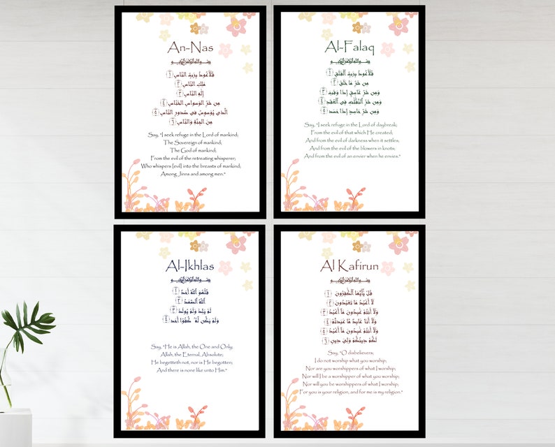 May include: Four printable Islamic art prints with Arabic calligraphy and English translations. The prints feature a floral design in shades of pink, orange, and yellow. The text includes the names of the surahs An-Nas, Al-Falaq, Al-Ikhlas, and Al-Kafirun.