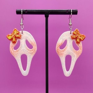 Customizable glitter ghostface with bow earrings, scream earrings, ghostface earrings, halloween earrings, horror earrings