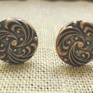 Two Copper Cabinet or Drawer Pulls with a Swirl Design - 1 1/4" Diameter