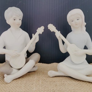 Ardalt Bisque Figurines of Boy and Girl Playing Musical Instruments