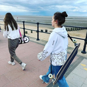 Portapatinetas: Correa de hombro para patineta ROSA