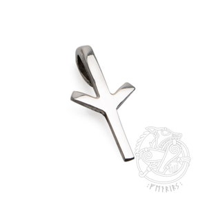 Könnte beinhalten: Ein silberfarbener Anhänger in Form eines stilisierten Pfeils oder einer Rune. Der Anhänger hat oben eine Schlaufe für eine Kette. Das Design ist schlicht und modern, mit klaren Linien und einer polierten Oberfläche. Der Anhänger ist wahrscheinlich aus Metall.
