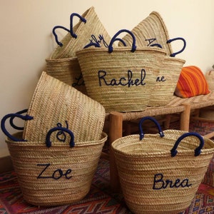 Straw bags with short wrapped handles 
Customize your bag with words or phrases
