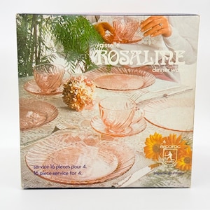May include: A set of three ceramic mugs with a speckled, cream-colored glaze. Each mug features a different hand-painted floral design in shades of blue, green, and yellow. The mugs have a simple, rounded shape and a comfortable handle.