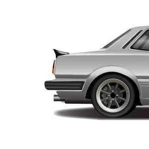 May include: A silver car with a black rear spoiler and black wheels. The car has a single exhaust pipe on the left side.