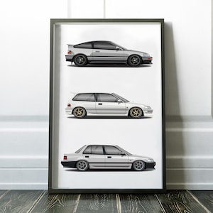 May include: A framed print featuring three white Honda Civics, each with a different body style. The top car is a two-door coupe, the middle car is a four-door hatchback, and the bottom car is a four-door saloon.