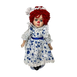 Seymour Mann Raggedy Ann Porcelain Doll with Stand