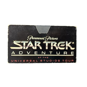 May include: A black and red Star Trek Adventure Universal Studios Tour VHS tape.