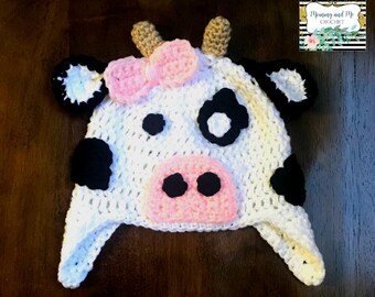 Crochet cow with pink bow beanie hat with ear covers and braids