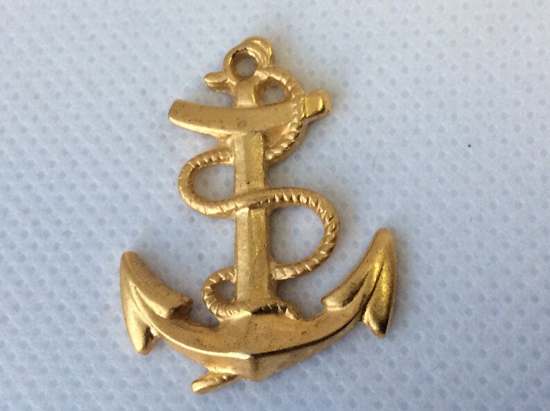 Vintage gold plated ship anchor pendant.