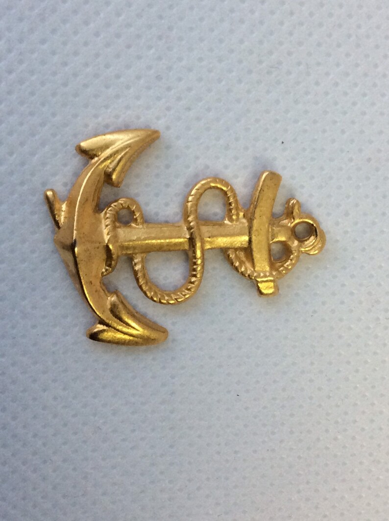Vintage gold plated ship anchor pendant.