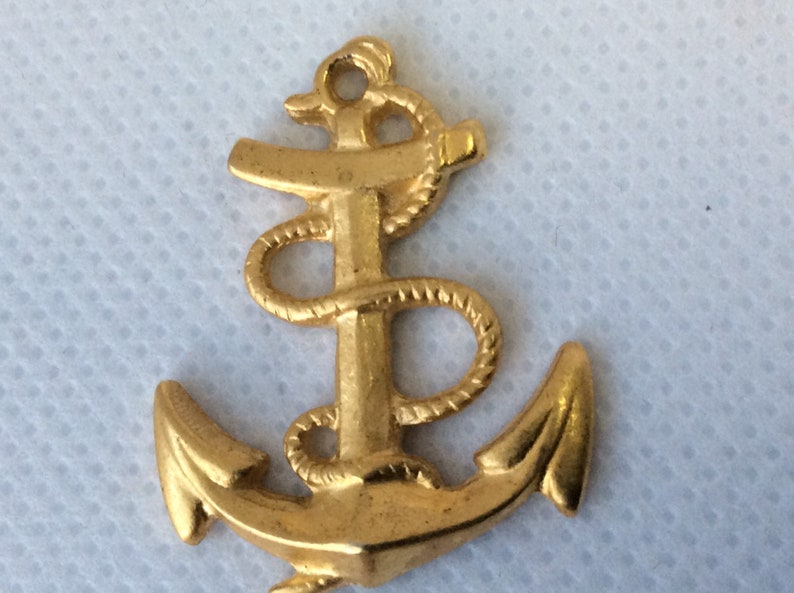 Vintage gold plated ship anchor pendant.