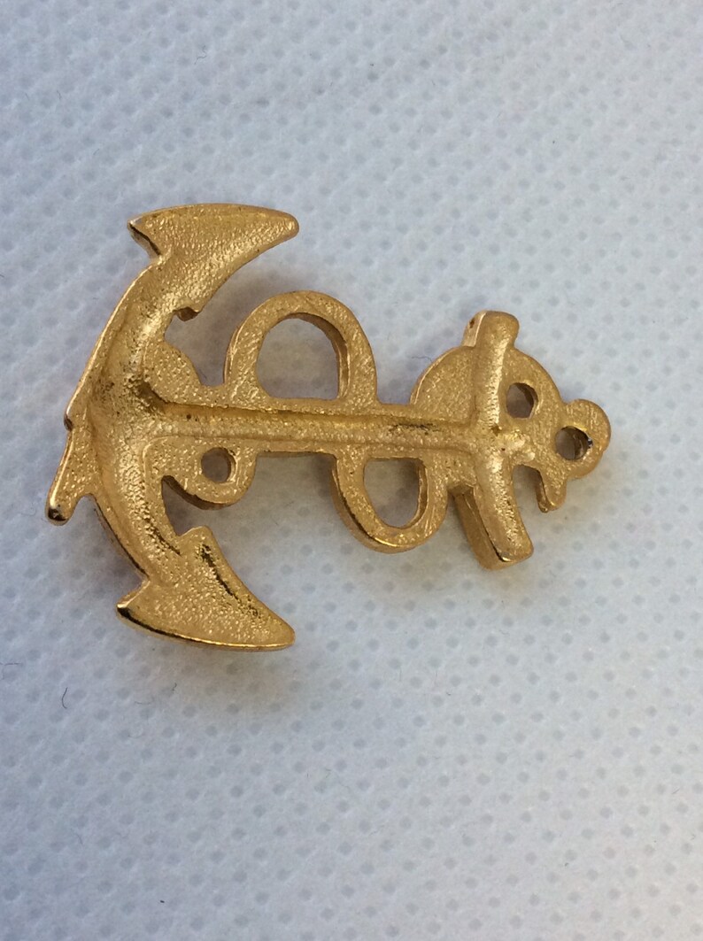Vintage gold plated ship anchor pendant.