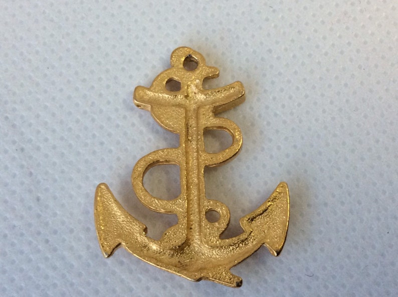 Vintage gold plated ship anchor pendant.