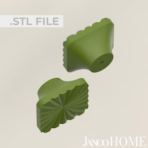 以下が含まれることがあります： 星形の模様が施された、緑色の幾何学的な形のキャビネットノブが2つ。ノブは滑らかでマットな素材で作られています。 .STL FILE