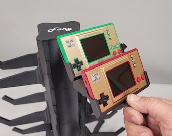 Spel- och klockhållare för Fang Controller Tower Neo