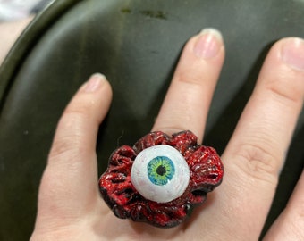 Mechaniczna pomarańcza - czerwone pierścienie Kroovy Eyeball