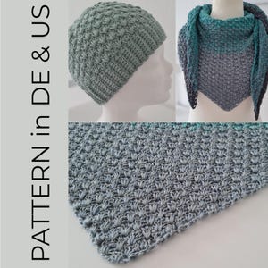 May include: A sage green crochet beanie and a triangular shawl featuring a gradient of teal, grey, and dark charcoal. The text "PATTERN in DE & US" is visible on the left side. The items display a textured, repeating stitch pattern.