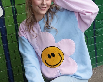 Pastel Half Blue Half Pink Pink Flower Smiley Face Sweat | Festival Hangover