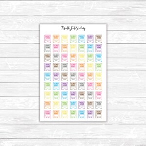 May include: A sheet of colorful stickers with the text "Calories Burned" in a banner shape. The stickers are in various colors, including pink, yellow, blue, green, and orange.