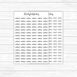 May include: Two sheets of white stickers with the words "workout" and "Totally Fab Stickers" printed in black. The word "workout" is repeated multiple times on the stickers. The stickers are on a white wooden surface.