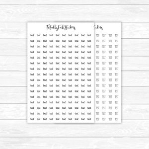 May include: A sheet of white sticker paper with the words "Totally Fab Stickers" printed at the top. The sheet is divided into two columns, each with multiple rows of the word "test" printed in black cursive handwriting.