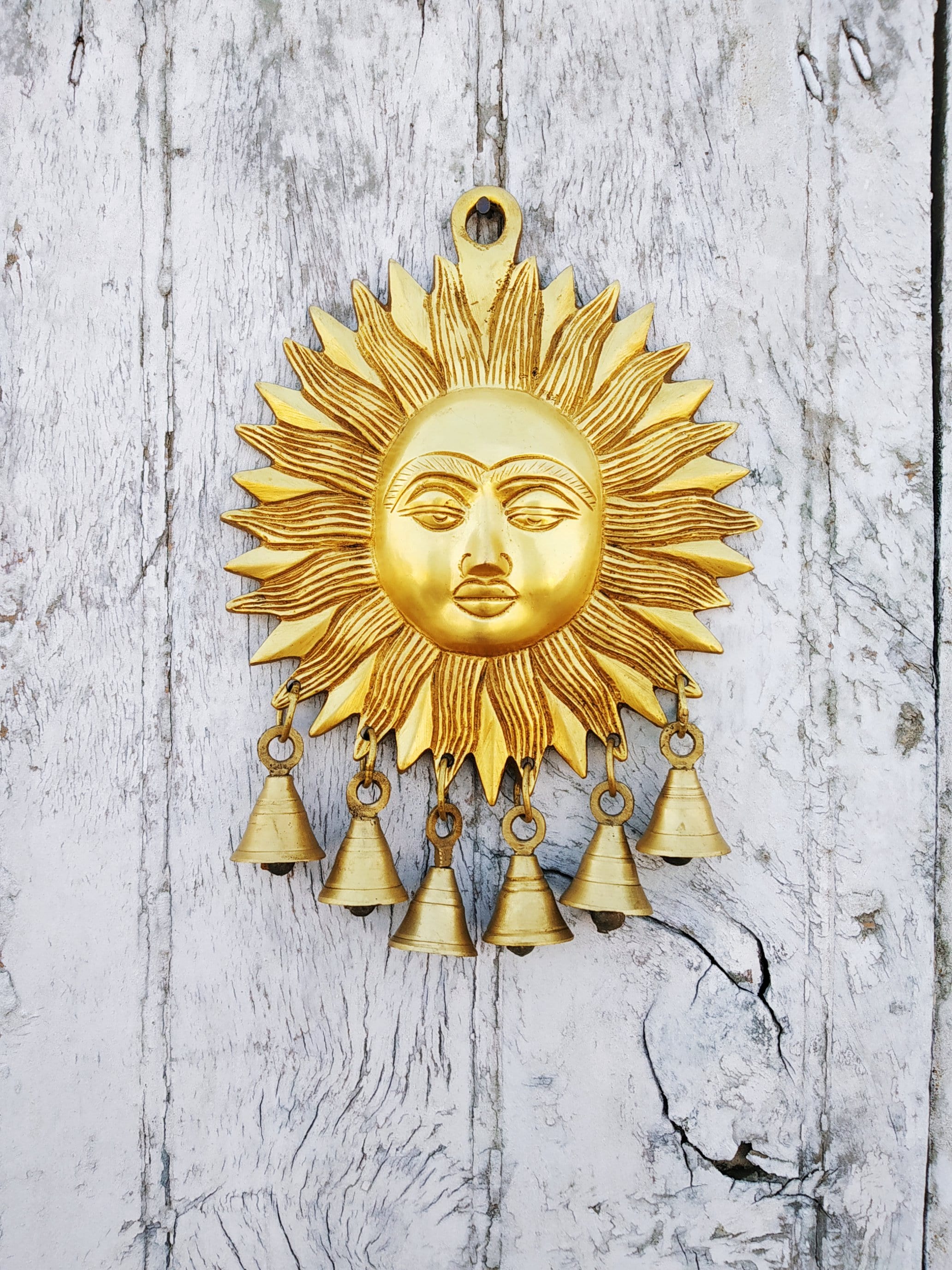 Brass sun wall hanging with six bells. Dimension LXB 20X16 cm. Etsy