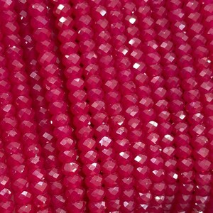 May include: Close-up of a strand of faceted, deep red beads. The beads are small, round, and evenly spaced, creating a textured surface. The color is a vibrant, saturated red, with light reflecting off the facets.