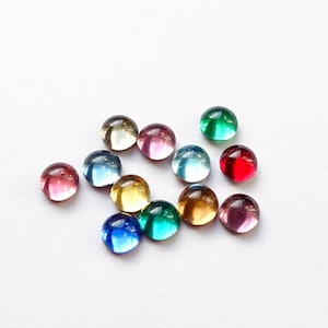 36 cabochoner, 4 mm, folierade glasstenar, runda, gröna, blå, orange, röda, opalstrasstenar, original, tillverkade i Tyskland, 1960-tal