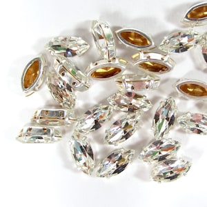 12 vintage glass stones 1970&#39;s crystal old silver rhinestones facetted 15x7 navette with setting for sewing on made in Germany