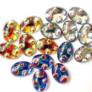 2 cabochons handmade glass stones 18x13mm oval sahara heliotrope purple yellow blue carved Bubble  space age made in western Germany 1970