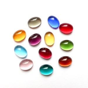 36 cabochons 8x6mm oval handmade glass stones transparent color mix made in Germany 1970s