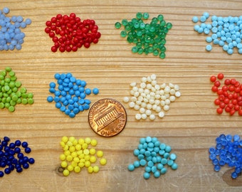 72 handmade glass stones cabochons 3mm round green blue orange red rhinestones originally made in Germany 1960s