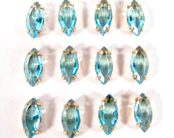 12 vintage glass stones 1970s turquoise aquamarine rhinestones 15x7 navette with setting for sewing on threading made in germany