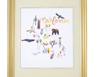 May include: A framed print of a watercolor illustration of the state of California with various icons representing the state, including a red bridge, a bear, a whale, a sea lion, a palm tree, a lemon, a surfboard, and a pelican. The text "California" is written in cursive across the top of the print.