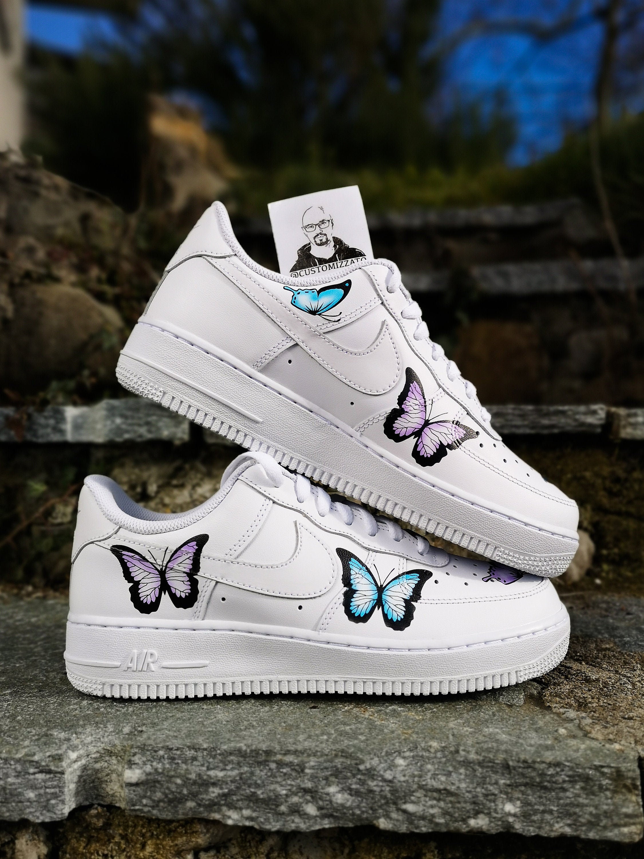 white nike air force 1 with butterflies
