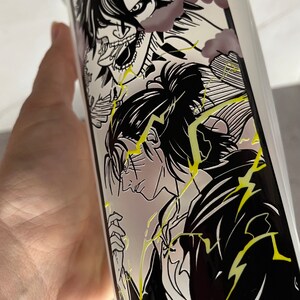 May include: Black and white illustration of two anime characters on a white tumbler. The characters are drawn in a manga style with dramatic poses and expressions. The background is filled with yellow lightning bolts.