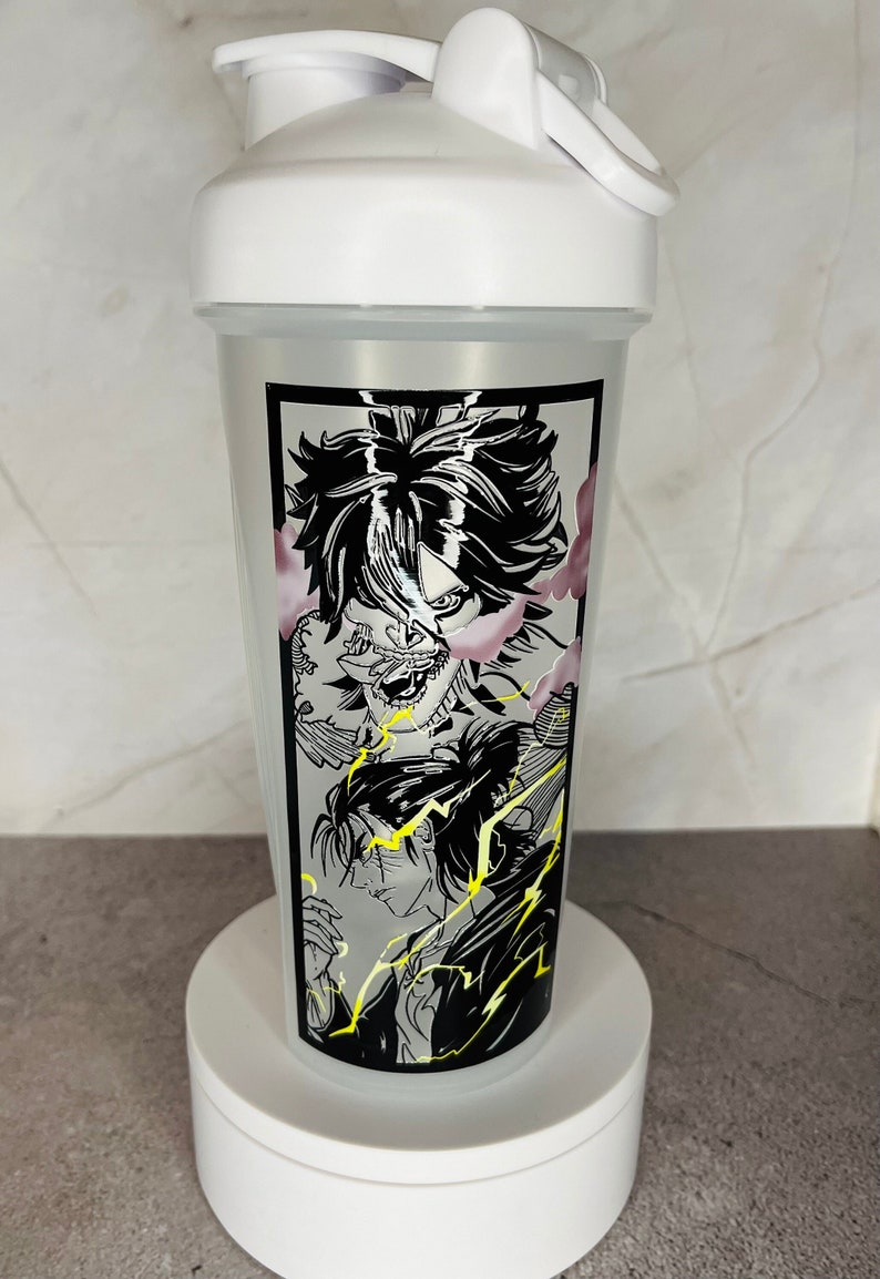May include: White shaker bottle featuring a black and white graphic of an anime character with lightning bolts. The character has a fierce expression and is surrounded by clouds.