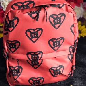 Adinkra Symbol Onyankopon Adom Nti Biribiara Beye Yie Water Resistant Backpack