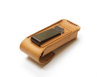 Leather edc belt case for multitool with metal belt clip.