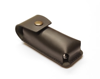 Leather belt case for multitool with metal belt clip.