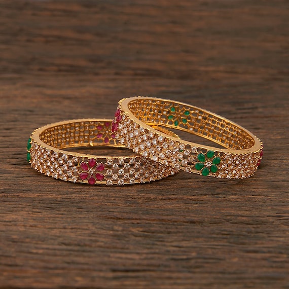 Gold polki bangles best sale designs