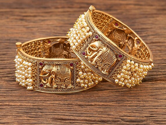 Gold bangles broad shop