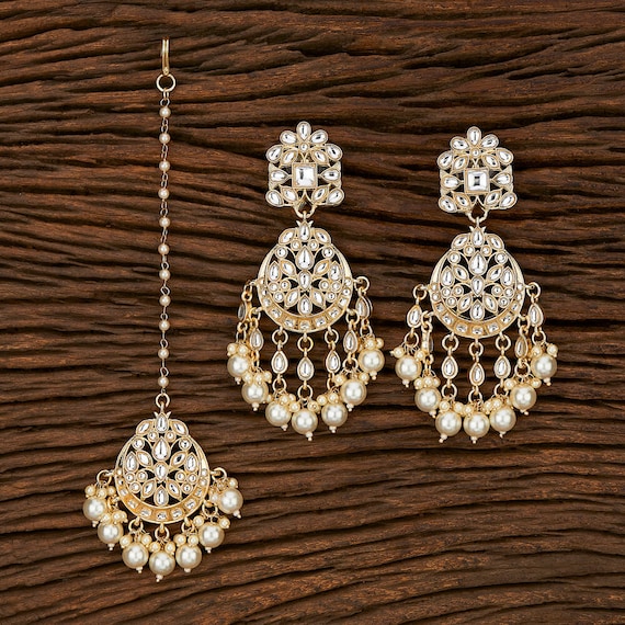 Earrings with cheap tikka