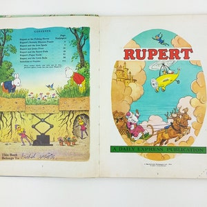 K&ouml;nnte beinhalten: Ein Vintage-Kinderbuchcover mit Rupert B&auml;r, einer Comicfigur, die in einem gelben Hubschrauber &uuml;ber einem Schloss fliegt. Das Cover tr&auml;gt den Titel "RUPERT" und enth&auml;lt den Text "A DAILY EXPRESS PUBLICATION" und "60p".