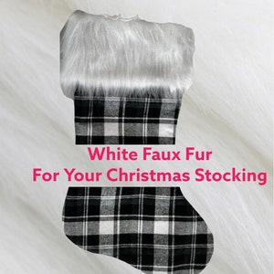 May include: White faux fur trim for a black and white plaid Christmas stocking.